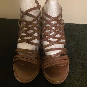 Sandals that were barely worn and are in excellent condition. 2 inch heel